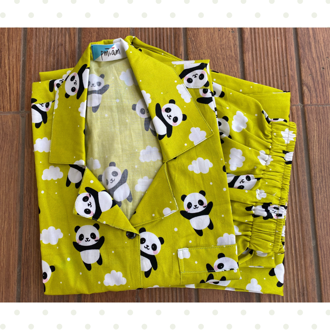 Flat lay of the panda on lime night suit.