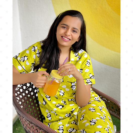 A girl in the Panda on Lime Green Night suit.